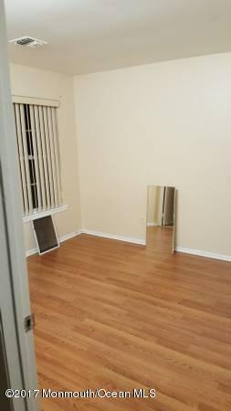 60 County Road, Unit A003 Cliffwood, NJ 07721 - Photo 3 of 26 sandy bedroom empty