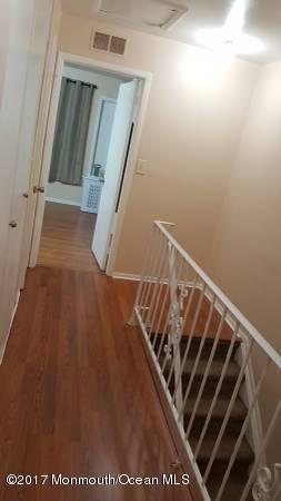 60 County Road, Unit A003 Cliffwood, NJ 07721 - Photo 5 of 26 sandy hallway