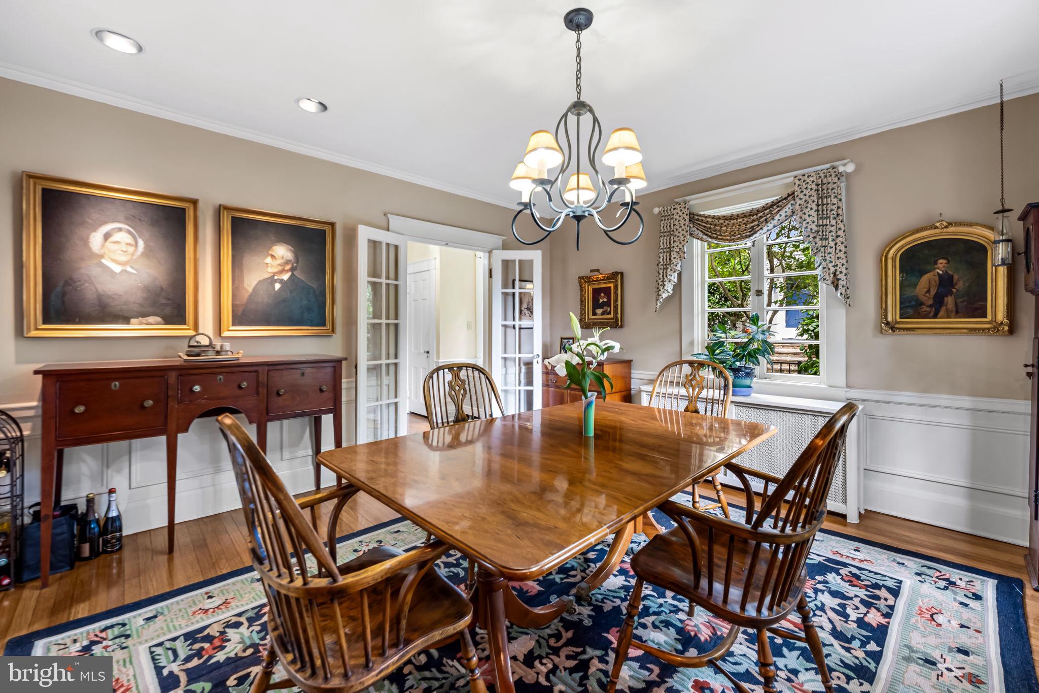 305 Tunbridge Road Baltimore, MD 21212 - Photo 19 of 58 a view of a dining room with furniture window and wooden floor