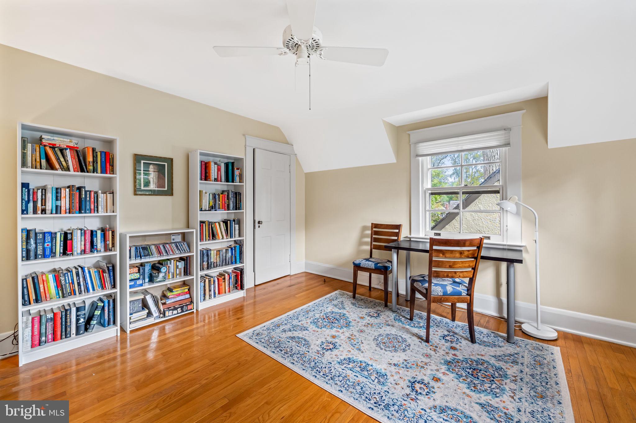 305 Tunbridge Road Baltimore, MD 21212 - Photo 30 of 58 a view of a workspace with furniture bookshelf and a window