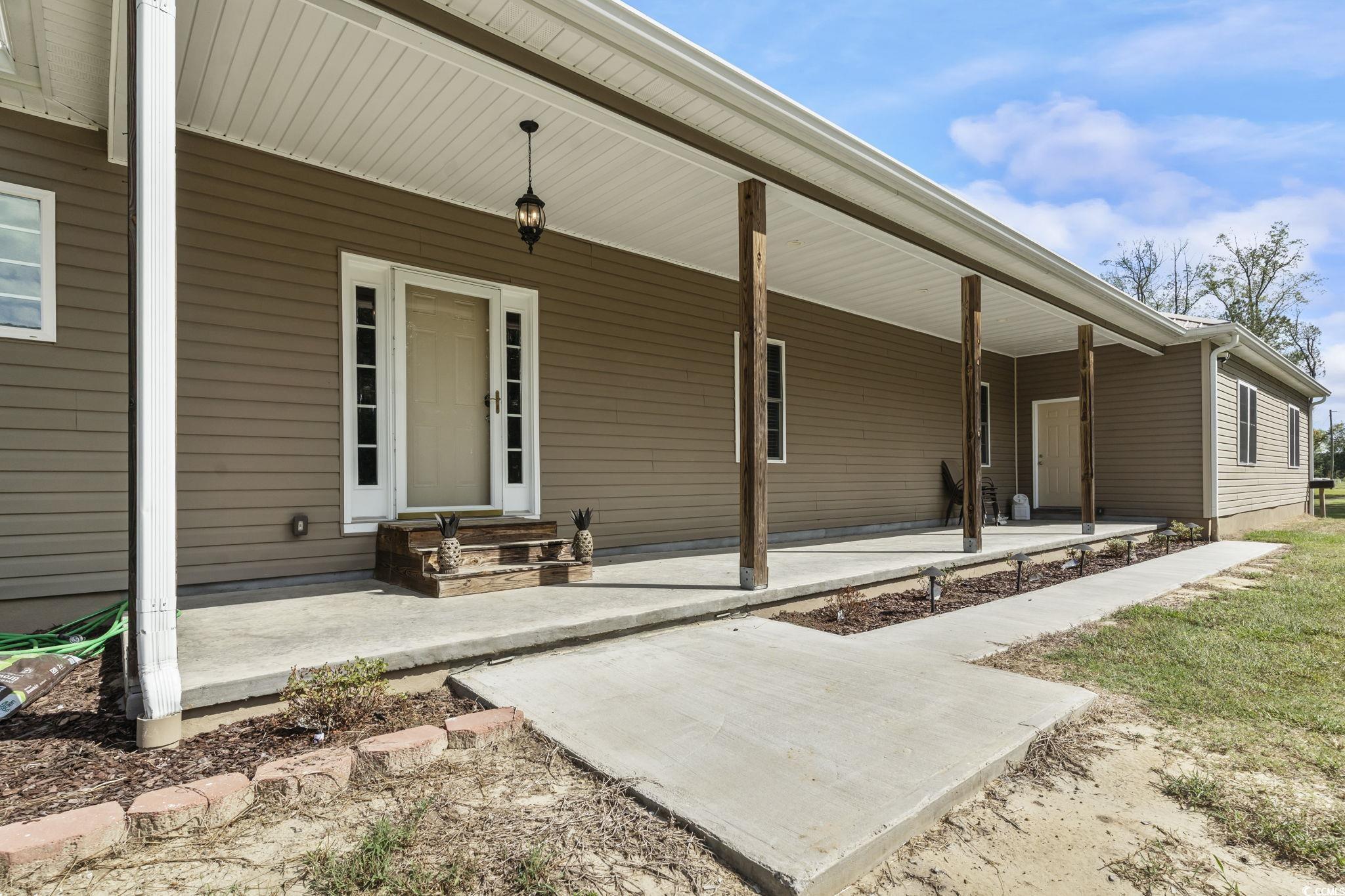 1585 Daisy Road Loris, SC 29569 - Photo 2 of 48 View of porch
