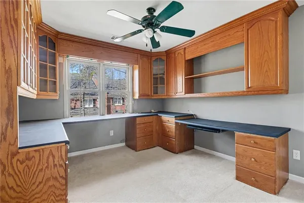 a kitchen with stainless steel appliances granite countertop a stove and a sink with cabinets