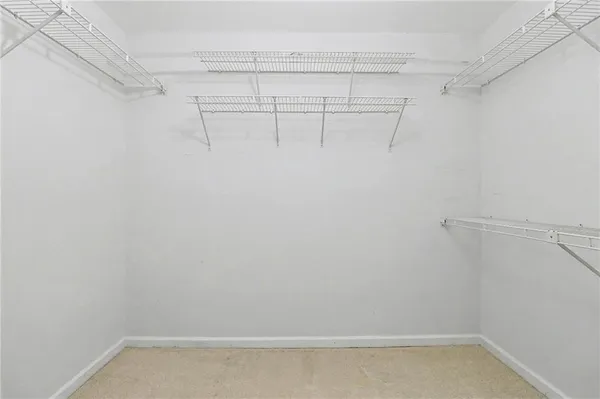 a view of a room with racks on the wall