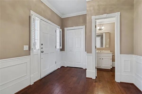 wooden floor with white walls