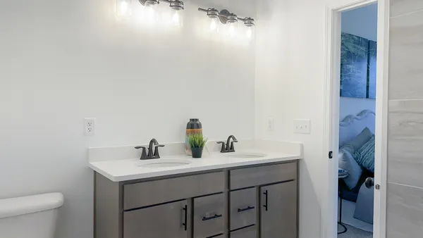 a bathroom with a sink and a toilet
