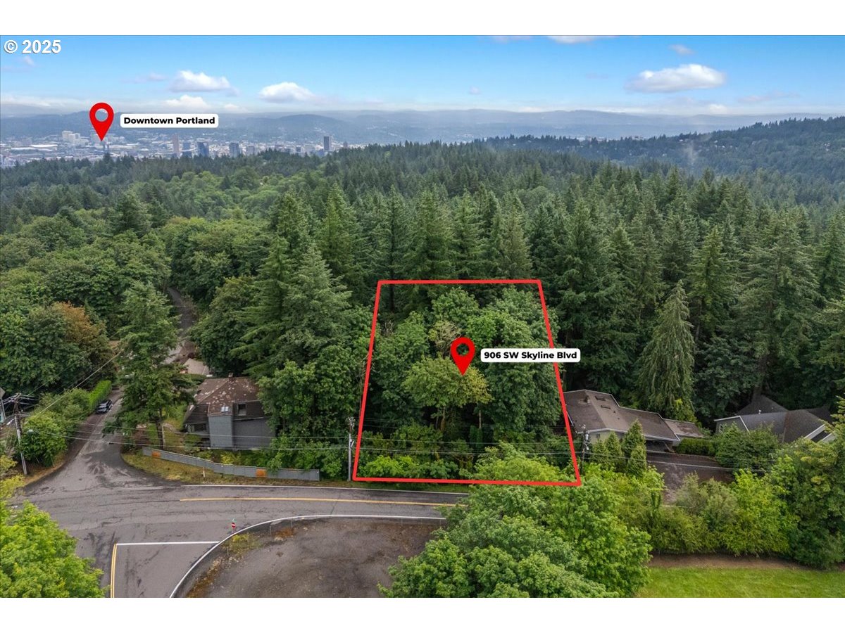 906 Southwest Skyline Boulevard Portland, OR 97221 - Photo 1 of 12 a view of a green and yard