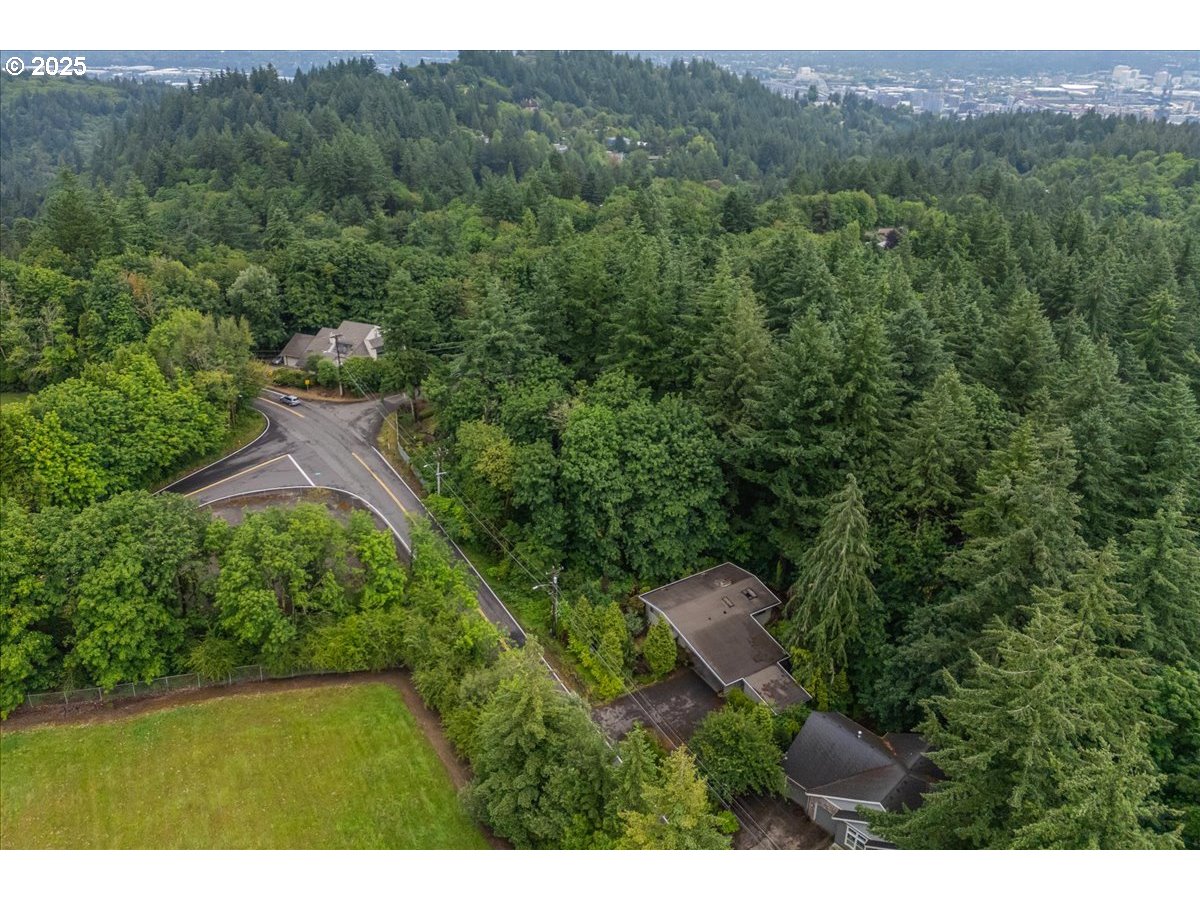 906 Southwest Skyline Boulevard Portland, OR 97221 - Photo 8 of 12 a view of an outdoor space and a yard