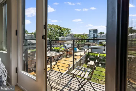 a view of swimming pool from a balcony