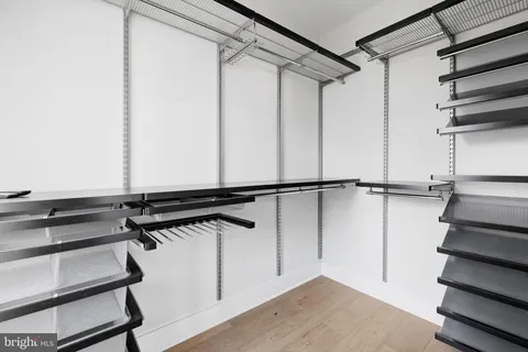 a view of a room with racks on the wall