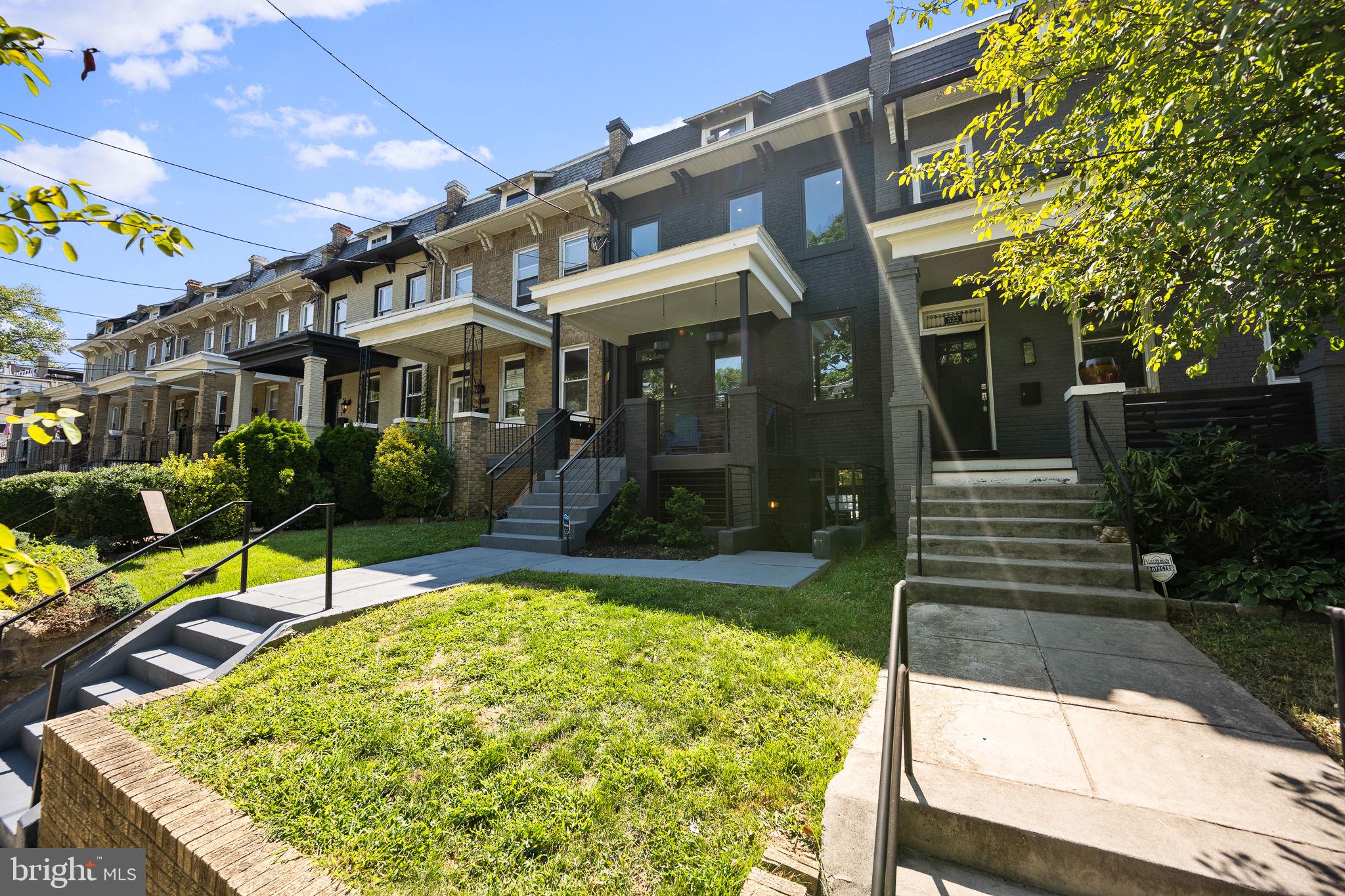 320 Webster Street Northwest, Unit 2 Washington, DC 20011 - Photo 2 of 25 a view of a house with garden and sitting area