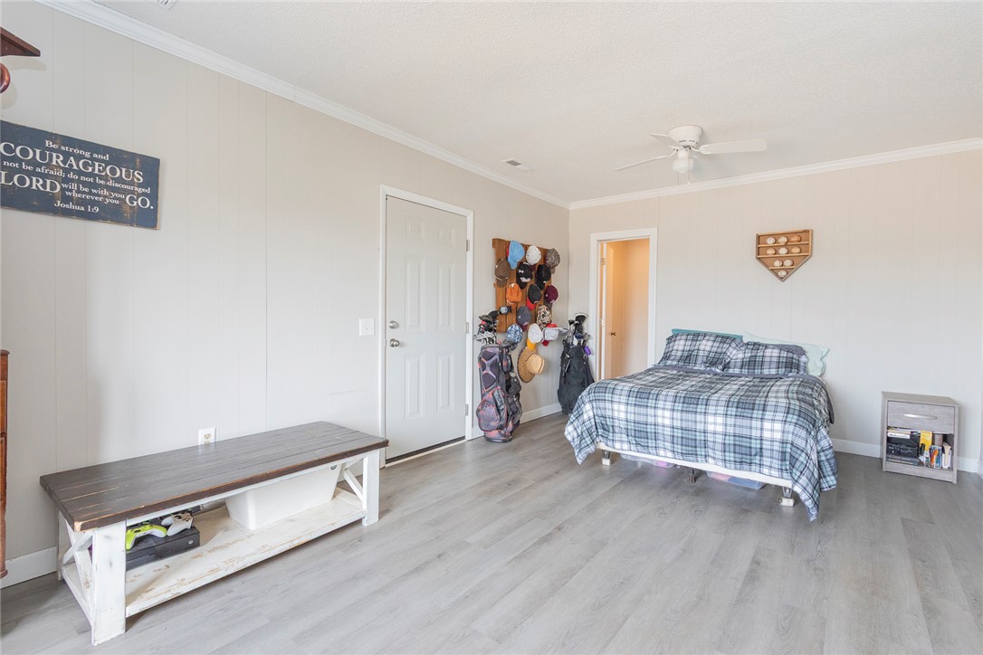 1331 Centerville Road Anderson, SC 29625 - Photo 13 of 35 Bright and airy bedroom features light-toned flooring and a convenient ceiling fan.