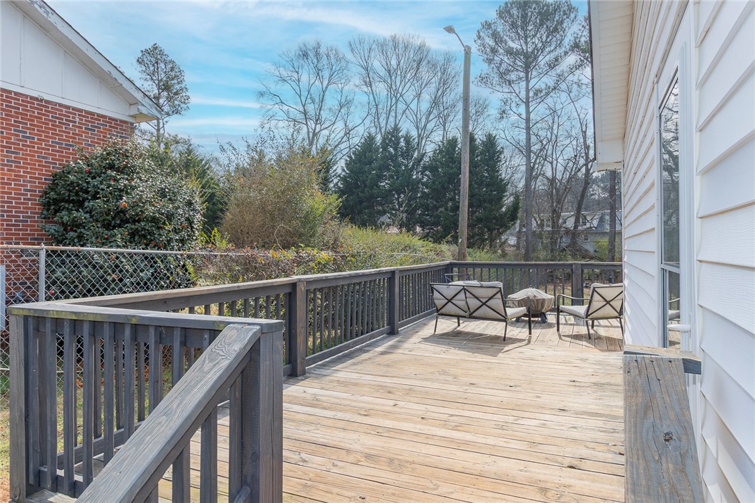 1331 Centerville Road Anderson, SC 29625 - Photo 26 of 35 This spacious deck offers a tranquil retreat for outdoor living and entertaining.