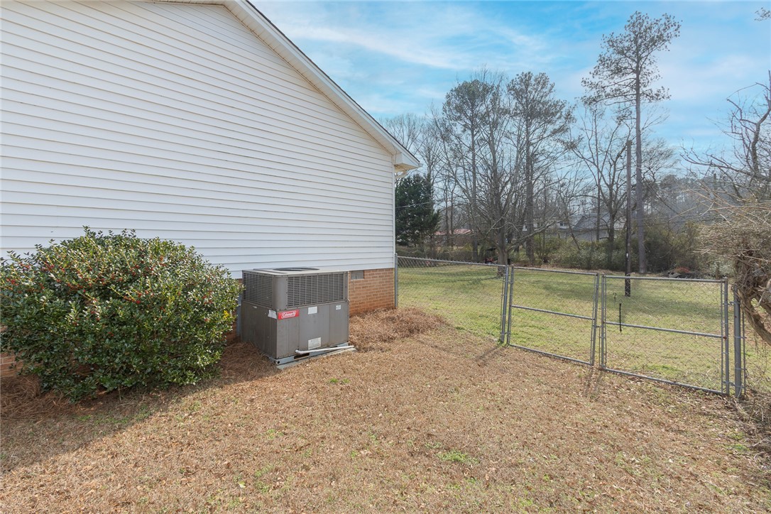1331 Centerville Road Anderson, SC 29625 - Photo 28 of 35 This charming home features vinyl siding and a fenced yard, providing both curb appeal and privacy.