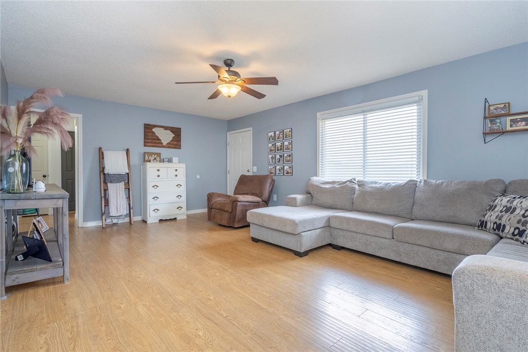 1331 Centerville Road Anderson, SC 29625 - Photo 5 of 35 This inviting living space features warm flooring and ample natural light, perfect for everyday living.