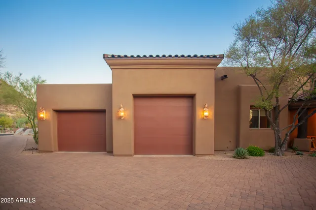 a living room with furniture a large window and a flat screen tv