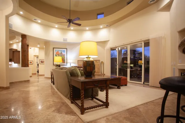 a view of a patio with table and chairs and potted plants