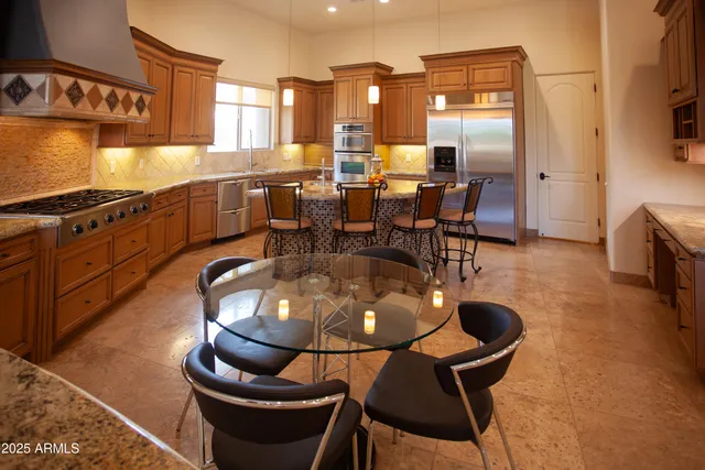 a bedroom with a bed and a television