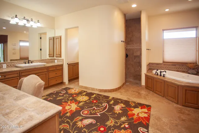 a view of a swimming pool and lounge chair