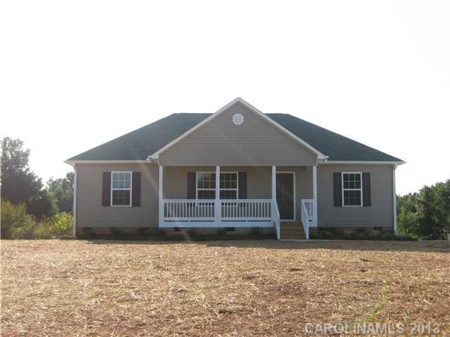 305 Springlake Road York, SC 29745 - Photo 1 of 16 a front view of a house with a yard