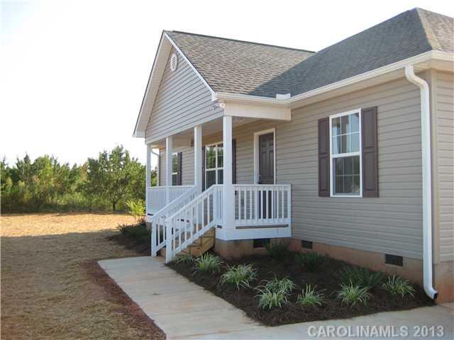 305 Springlake Road York, SC 29745 - Photo 2 of 16 a view of a house with a yard