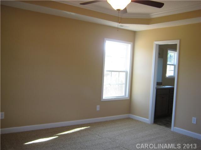 305 Springlake Road York, SC 29745 - Photo 12 of 16 an empty room with windows