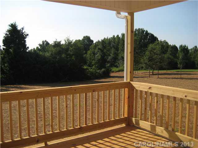 305 Springlake Road York, SC 29745 - Photo 14 of 16 a view of a balcony with yard