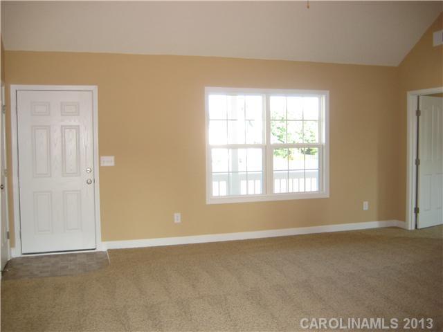 305 Springlake Road York, SC 29745 - Photo 5 of 16 an empty room with windows