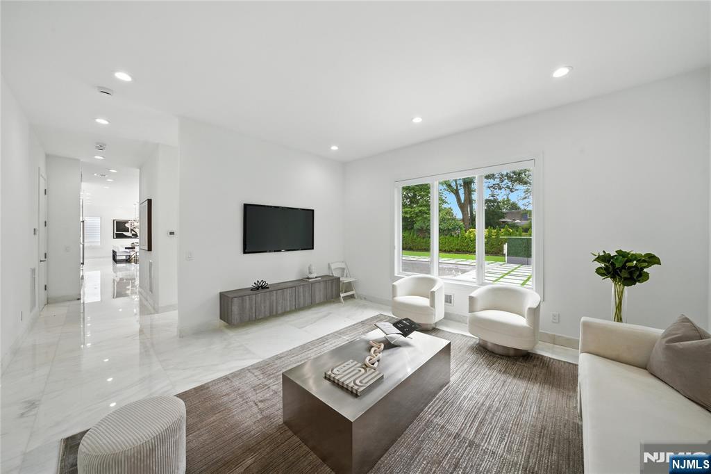 44 Floral Terrace Tenafly, NJ 07670 - Photo 14 of 49 a living room with furniture and a large window