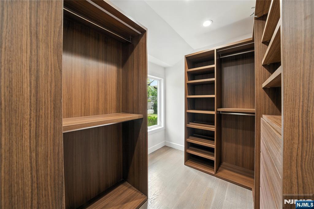 44 Floral Terrace Tenafly, NJ 07670 - Photo 25 of 49 a view of walk in closet with empty racks