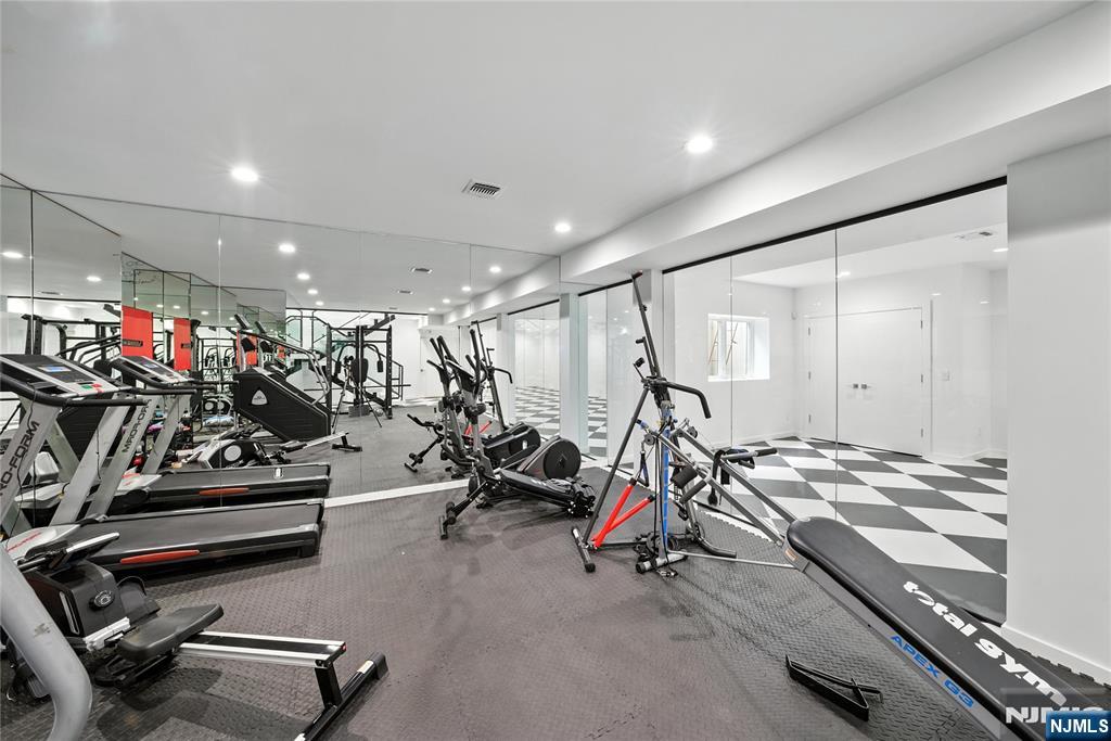 44 Floral Terrace Tenafly, NJ 07670 - Photo 33 of 49 a view of a room with gym equipment