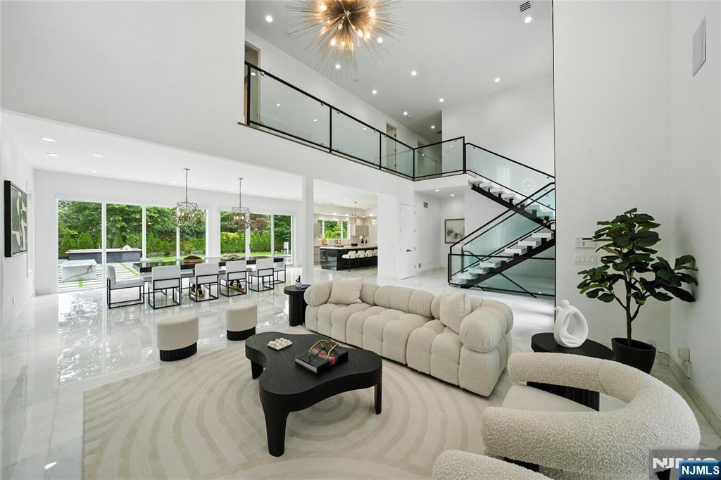 44 Floral Terrace Tenafly, NJ 07670 - Photo 5 of 49 a living room with furniture and a large window