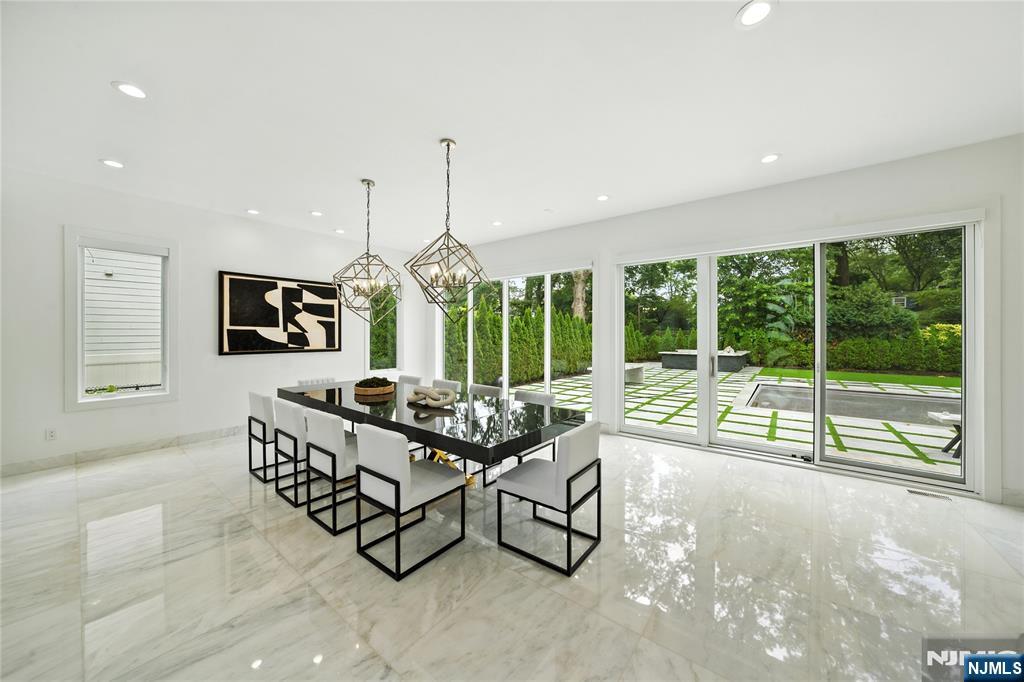 44 Floral Terrace Tenafly, NJ 07670 - Photo 7 of 49 a living room with furniture and large windows