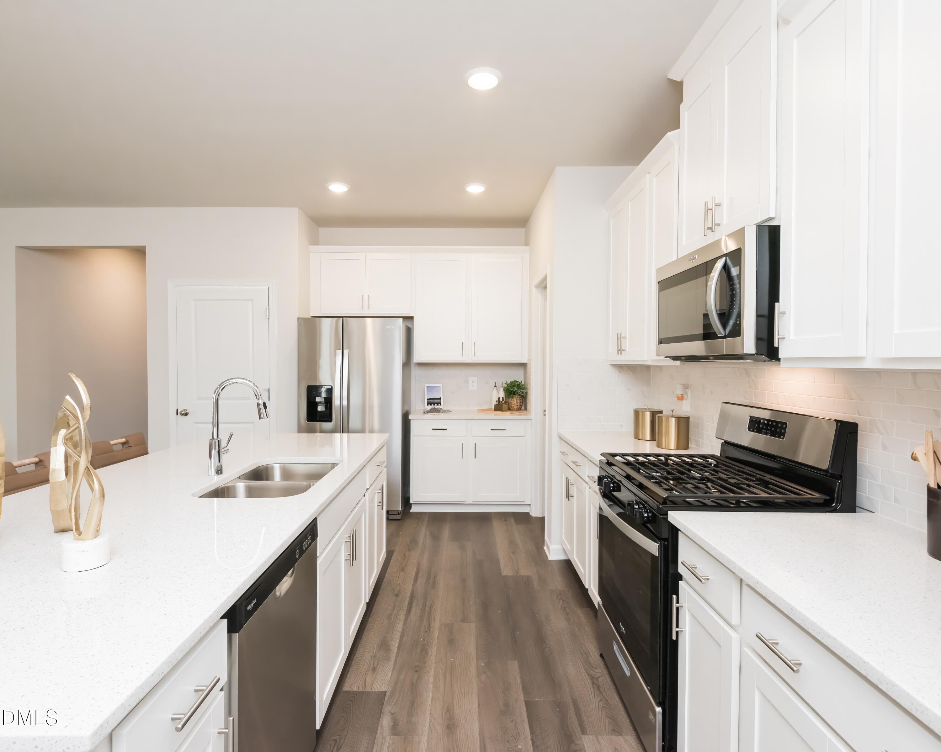 1510 Hatteras Road Durham, NC 27703 - Photo 2 of 22 05_Paisley_Kitchen