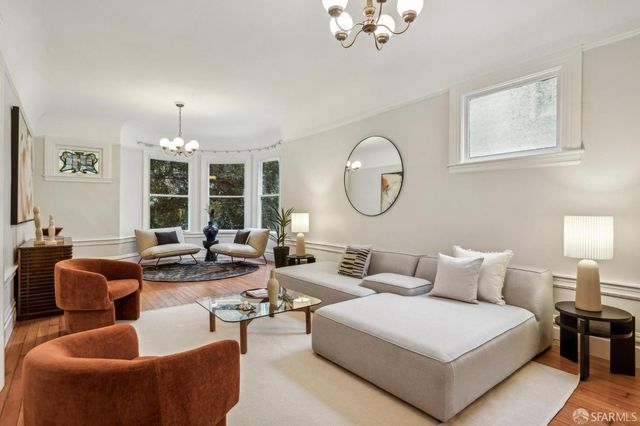 a bathroom with a mirror and a bathtub