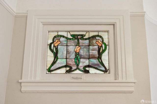 a kitchen with a refrigerator and a sink