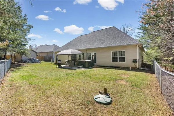 a view of a backyard with a garden