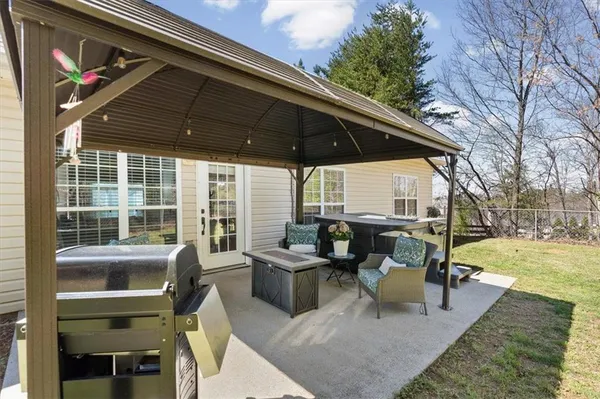 an aerial view of a house with outdoor space