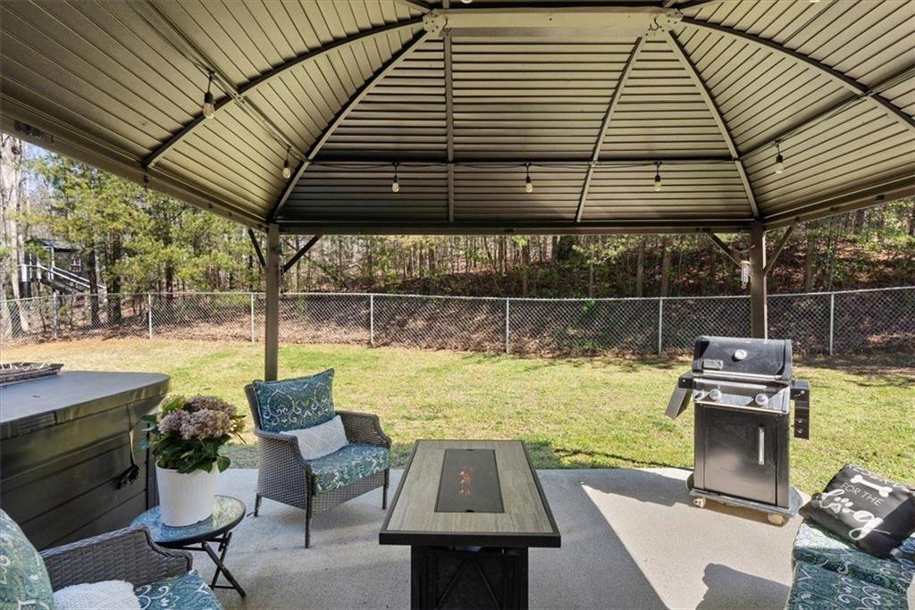 25 Cherokee Hills Drive Rydal, GA 30171 - Photo 48 of 59 a view of a chairs and table in the patio