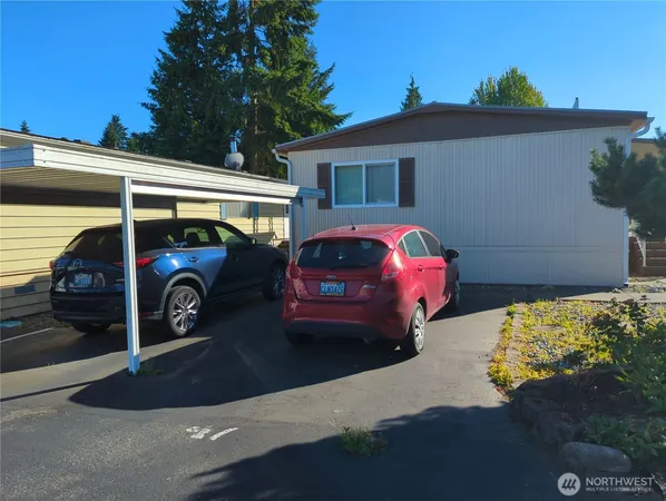 a car parked in front of a house