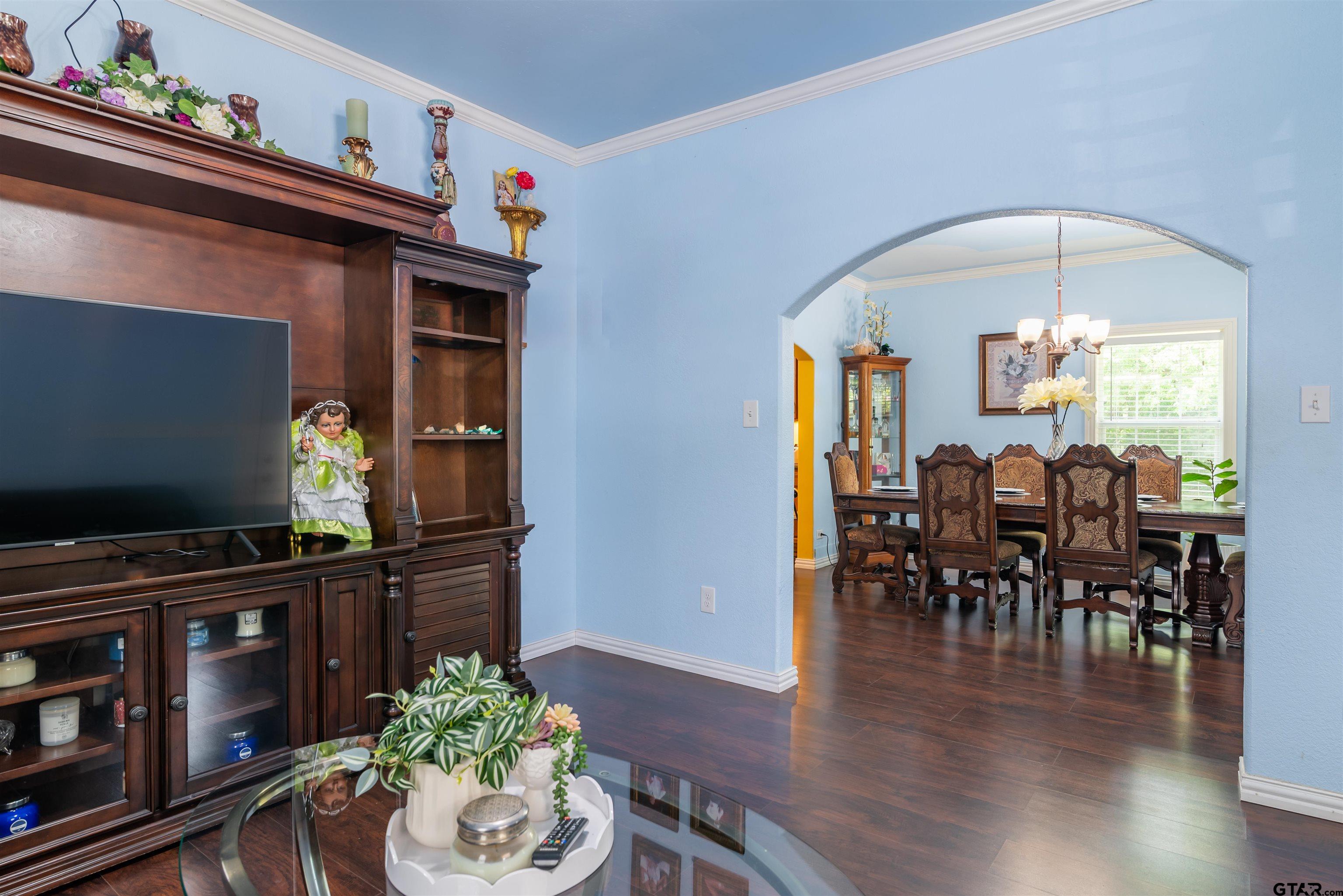 427 East Locust Street Tyler, TX 75702 - Photo 7 of 42 a dining room with furniture entryway and wooden floor