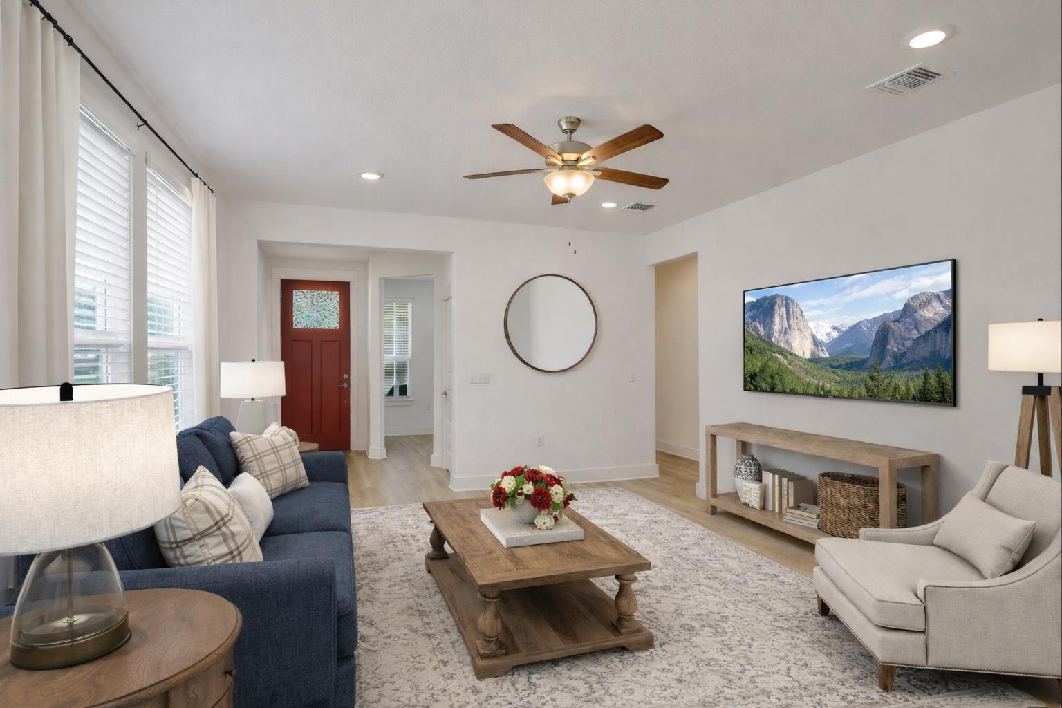 702 Kitty Hawk Road Georgetown, TX 78633 - Photo 4 of 20 a living room with furniture and a flat screen tv
