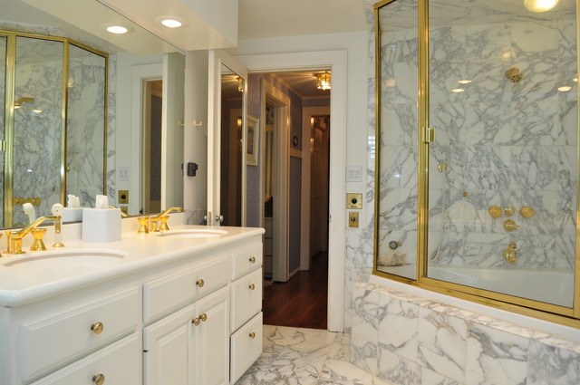 36W841 Crane Road St. Charles, IL 60174 - Photo 11 of 25 a bathroom with a granite countertop sink a mirror a shower and a bathtub