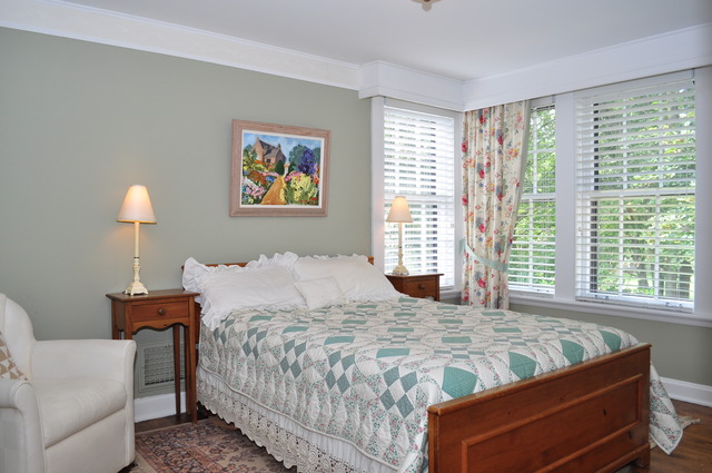 36W841 Crane Road St. Charles, IL 60174 - Photo 12 of 25 a bed sitting in a bedroom next to a window