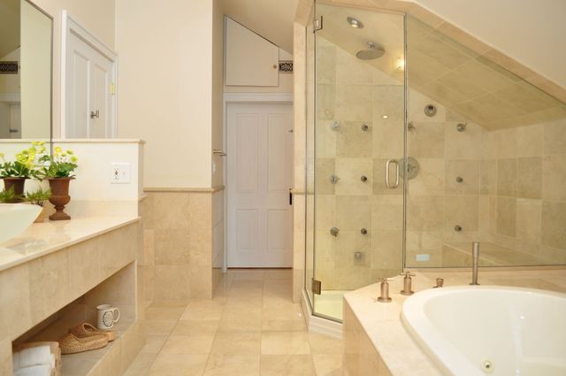 36W841 Crane Road St. Charles, IL 60174 - Photo 15 of 25 a bathroom with a tub shower and sink