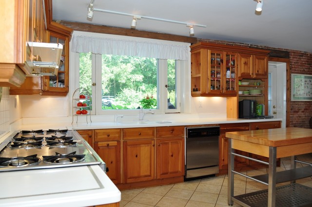 36W841 Crane Road St. Charles, IL 60174 - Photo 6 of 25 a kitchen with a stove a sink and a cabinets