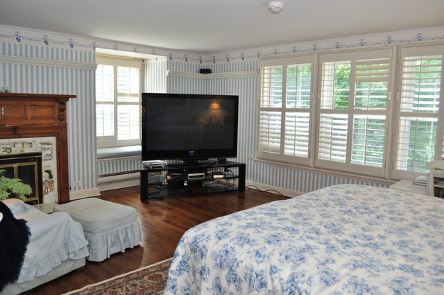 36W841 Crane Road St. Charles, IL 60174 - Photo 10 of 25 a bedroom with a bed and a flat screen tv