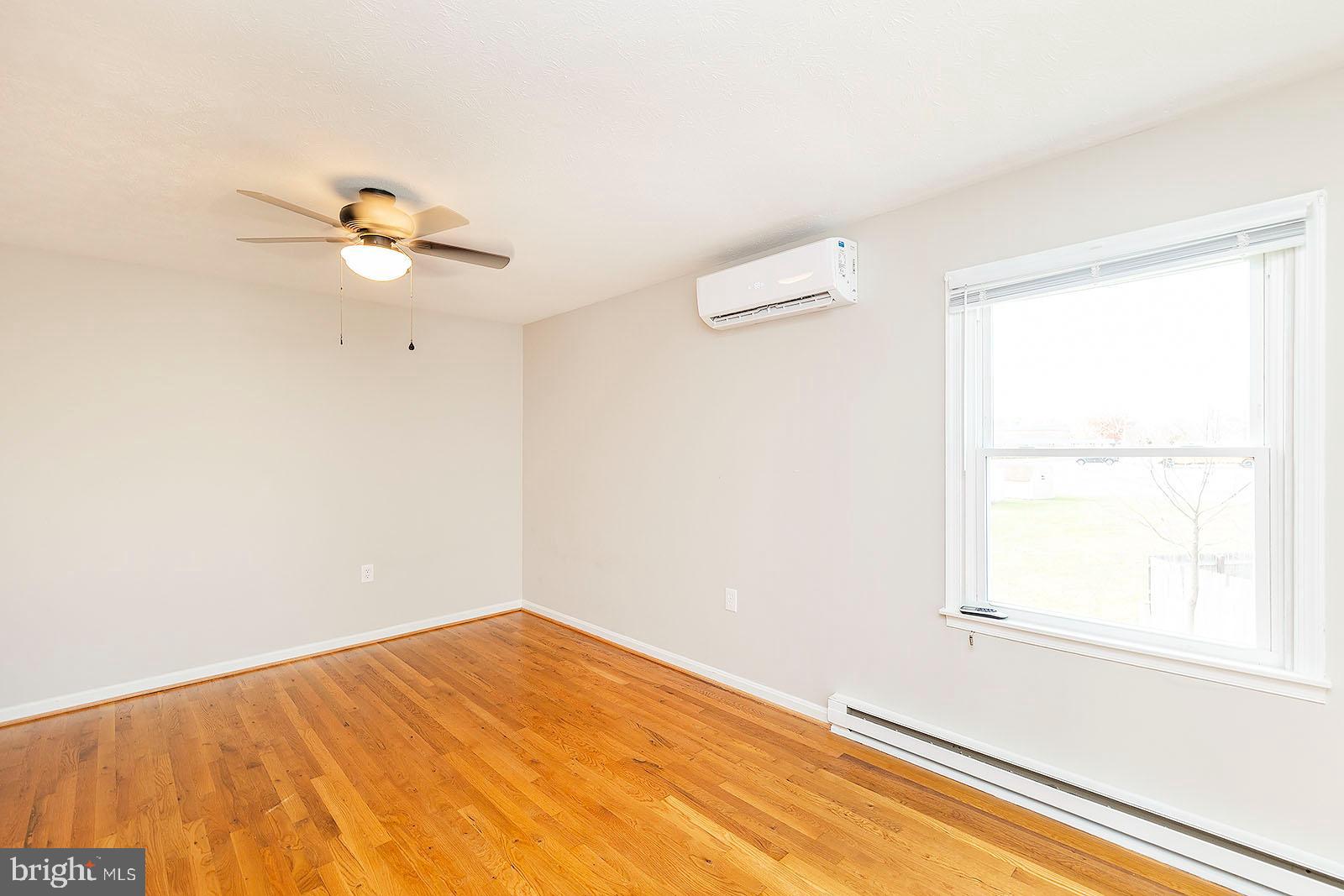 174 Double Church Road Stephens City, VA 22655 - Photo 19 of 29 a view of a room with a window and ceiling fan