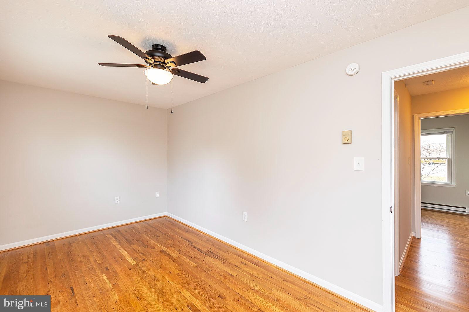 174 Double Church Road Stephens City, VA 22655 - Photo 21 of 29 a view of empty room with wooden floor