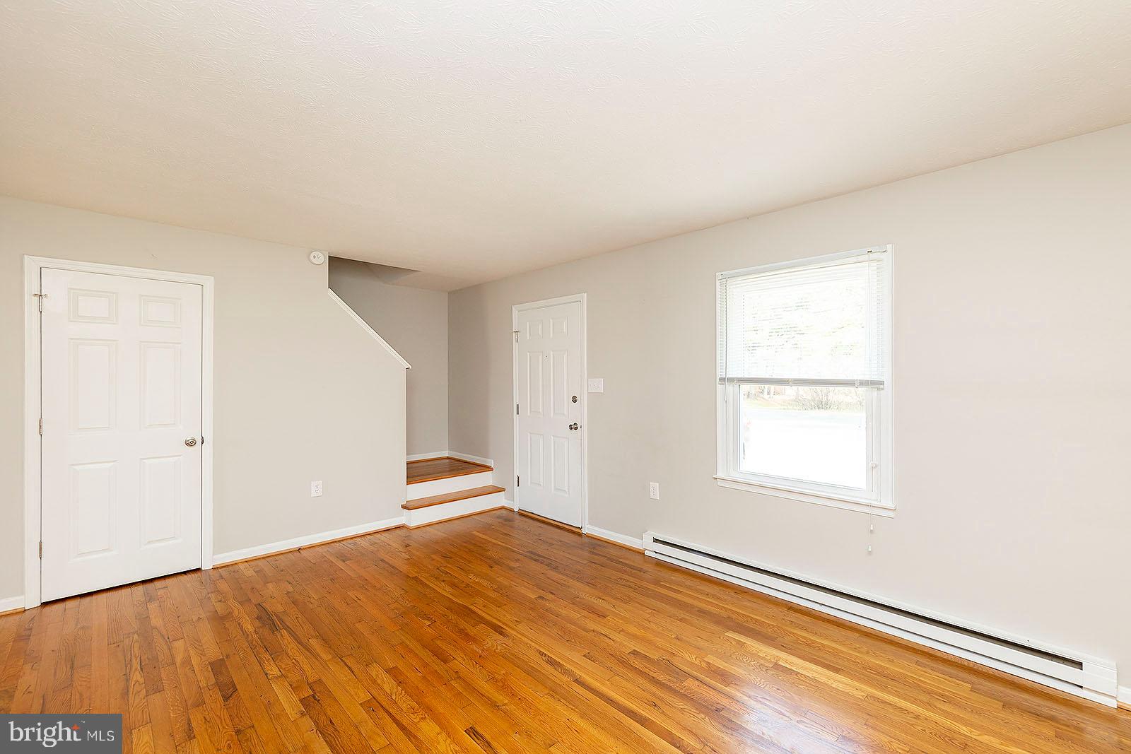 174 Double Church Road Stephens City, VA 22655 - Photo 4 of 29 an empty room with a window