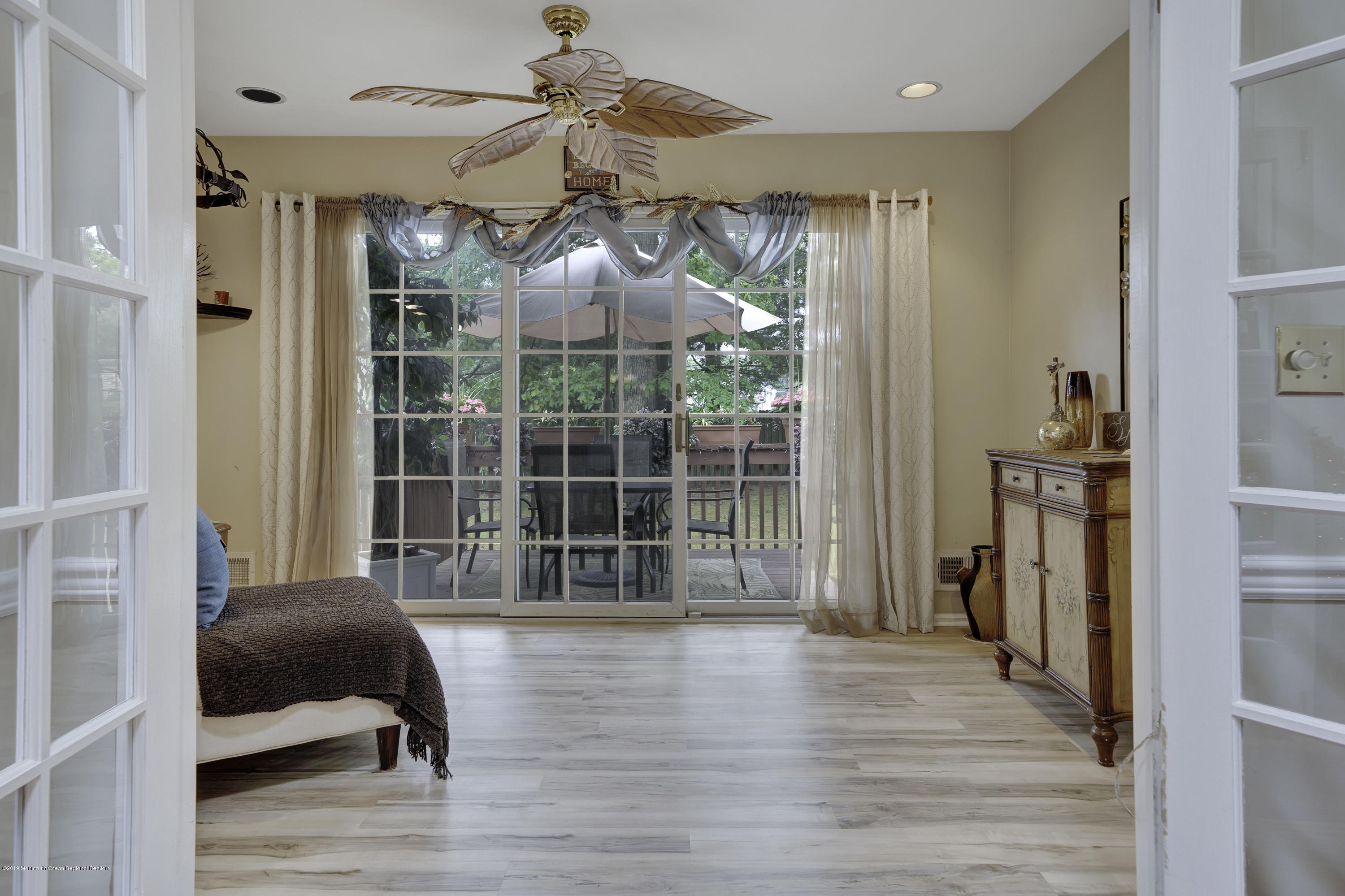 2 Cherrywood Circle, Unit 102 Brick, NJ 08724 - Photo 11 of 26 a view of a livingroom with wooden floor and furniture